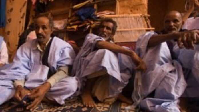 De gauche à droite, Ahmed, Sidi et Ahmed, chameliers de Chinguetti