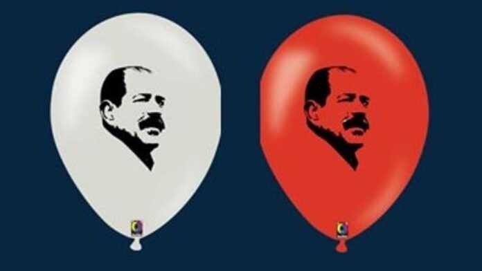 Portrait de Chokri Belaïd imprimé sur des ballons