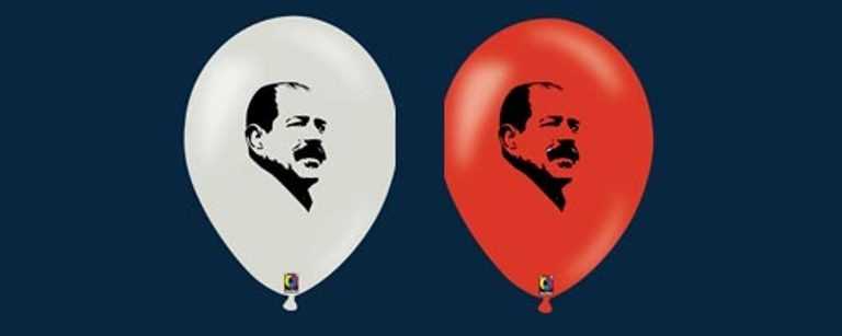 Portrait de Chokri Belaïd imprimé sur des ballons Portrait de Chokri Belaïd imprimé sur des ballons
