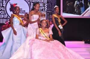 Phiona Kyeru middle new Miss Tourism