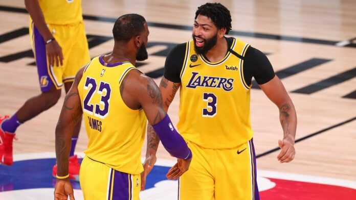 https___www.si.com_.image_MTc1NjI3NzQxNjIwNjEwNTQy_anthony-davis-lebron-james-lakers-gold