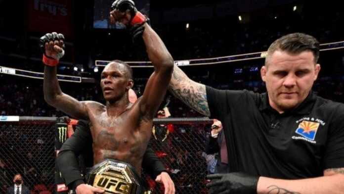 Israel Adesanya bat Vettori et conserve son titre