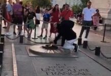 La flamme de la discorde : un geste choquant ravive les tensions autour de la mémoire La flamme du soldat inconnu