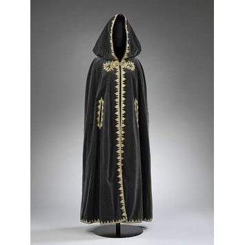 Black velvet cape with metal thread and silk embroidery, designed by Naima Bennis